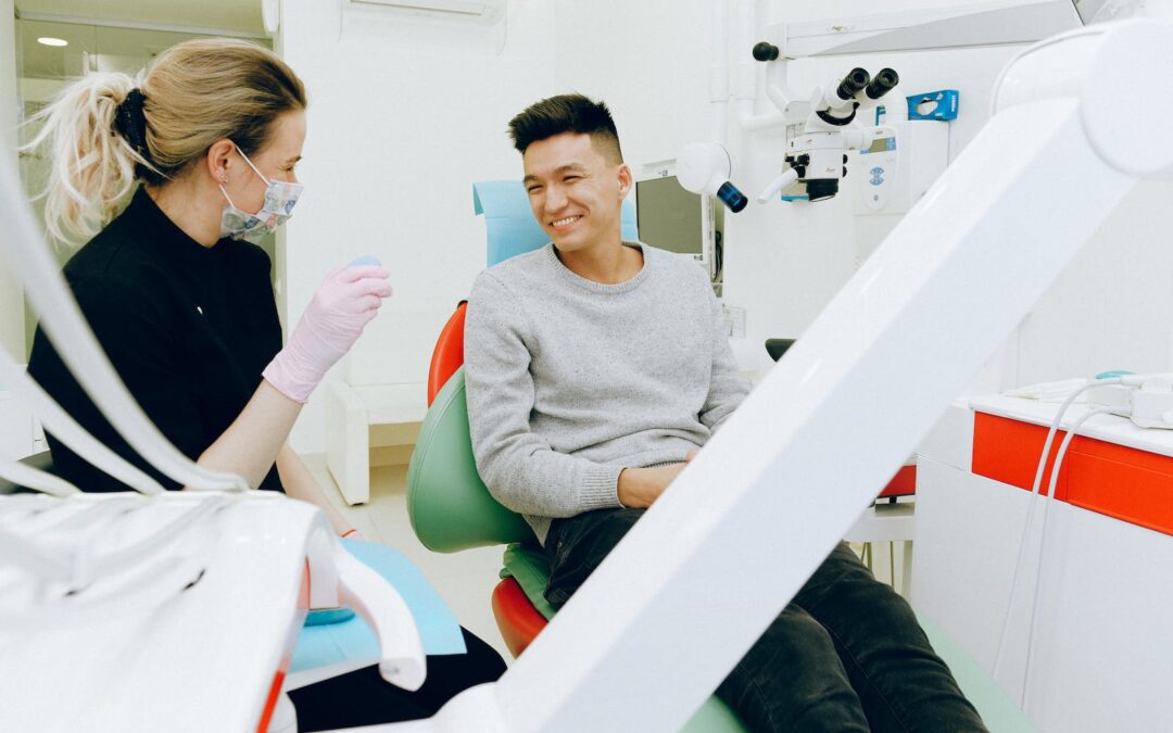 Man Sitting on Dental Chair